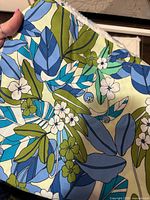 Close-up of blue and green floral print fabric