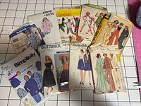 Overview of all pattern envelopes spread on cutting mat