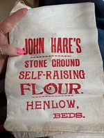 Front of flour bag with full red text visible