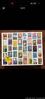 Front of puzzle box displaying book cover collage and 1000-piece label