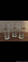 Front view of three Big Rock Brewery pint glasses