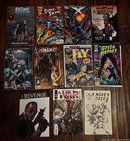 All eleven comics laid out front covers visible