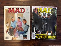 Front covers of both MAD magazines