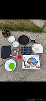 All items laid out: cookware, bakeware, serveware, kitchen tools