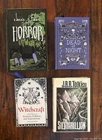 Group shot of all four books front covers visible