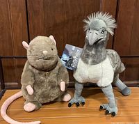 Buckbeak and rat plush side by side