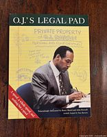 Front cover showing title, authors, illustration of O.J. writing