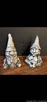 Both gnome statues front view