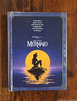 Front view of sealed The Little Mermaid hardcover notebook