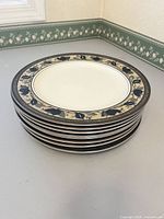 Stack of Mikasa dinner plates, Arabella pattern