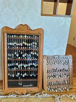 Front view of both spoon display racks filled with spoons