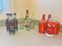 All 16 beverage bottles grouped on countertop