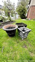 All three planters side by side on lawn
