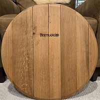 Front view of full oak lazy susan showing Bertranges branding