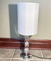 Full view of lamp showing shade and base