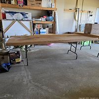 Full view of wooden folding table set up in garage