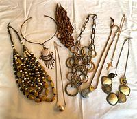 All eight necklaces laid out for overview