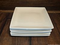 Stack showing six square plates