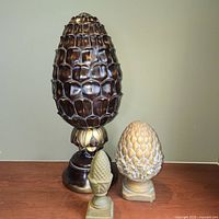 All three decorative artichoke finials