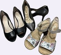 All three pairs of shoes arranged together