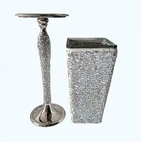Front view of vase and candle holder showing design and finishes