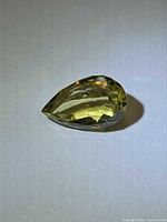 Pear cut yellow citrine side profile