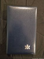 Closed blue Royal Canadian Mint presentation case