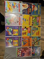 Overview of all 12 bagged comics arranged on table
