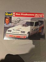 Front of sealed Revell Don Prudhomme Monza Funny Car model kit box