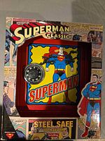 Box front showing Superman Classic steel safe with alarm