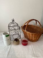 All items in the lot: basket, birdcage candle holder, four votives