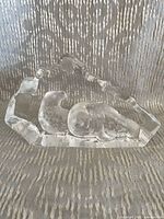 Front view of Mats Jonasson crystal sculpture showing two seals