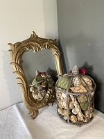 Mirror and potpourri cage close-up