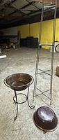 Copper bowls, wrought iron stand, tall rebar shelf full view