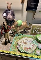 Figurines, platter, table runner