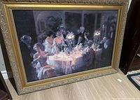 Full view of framed banquet scene canvas print on floor
