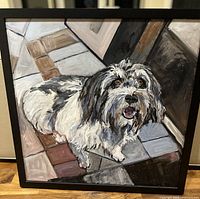 Full view of framed oil dog portrait painting