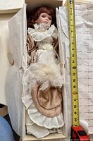 Scarlet doll in cream/ivory gown inside original box with tissue