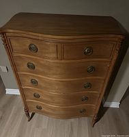 Front view of 5-drawer French Provincial dresser