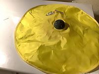 Top view of yellow Cat's Meow motorized cat toy showing overall condition