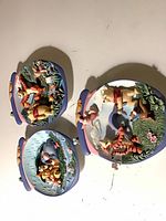 Front view of the three Disney Winnie the Pooh resin wall plaques