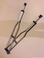 Pair of aluminum crutches standing together