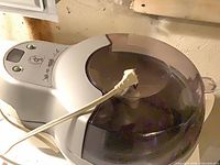 Top view showing overall ActiFry unit with clear lid and cord