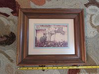 Front view showing full framed print with measuring tape