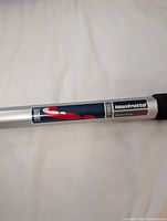 Manfrotto 3006 logo on silver leg section