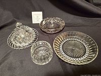 Group view of all four cut glass pieces