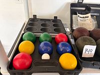 Newer bocce set with 8 coloured balls and white pallino in plastic case