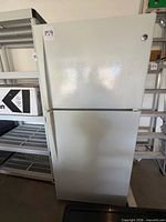 Full exterior view of GE refrigerator freezer