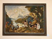 full view of framed needlepoint on wall