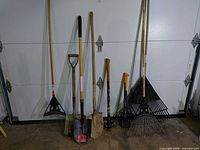 All five tools lined up against wall